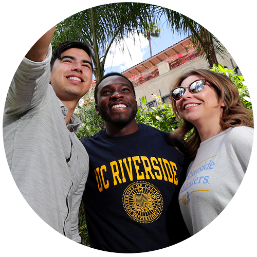 Three students at the UC Riverside campus taking a selfie